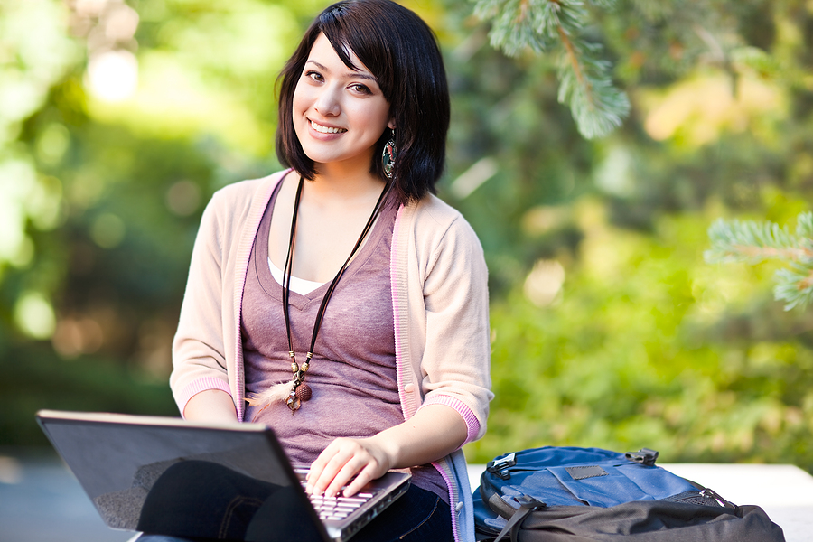 Mixed Race College Student With Laptop